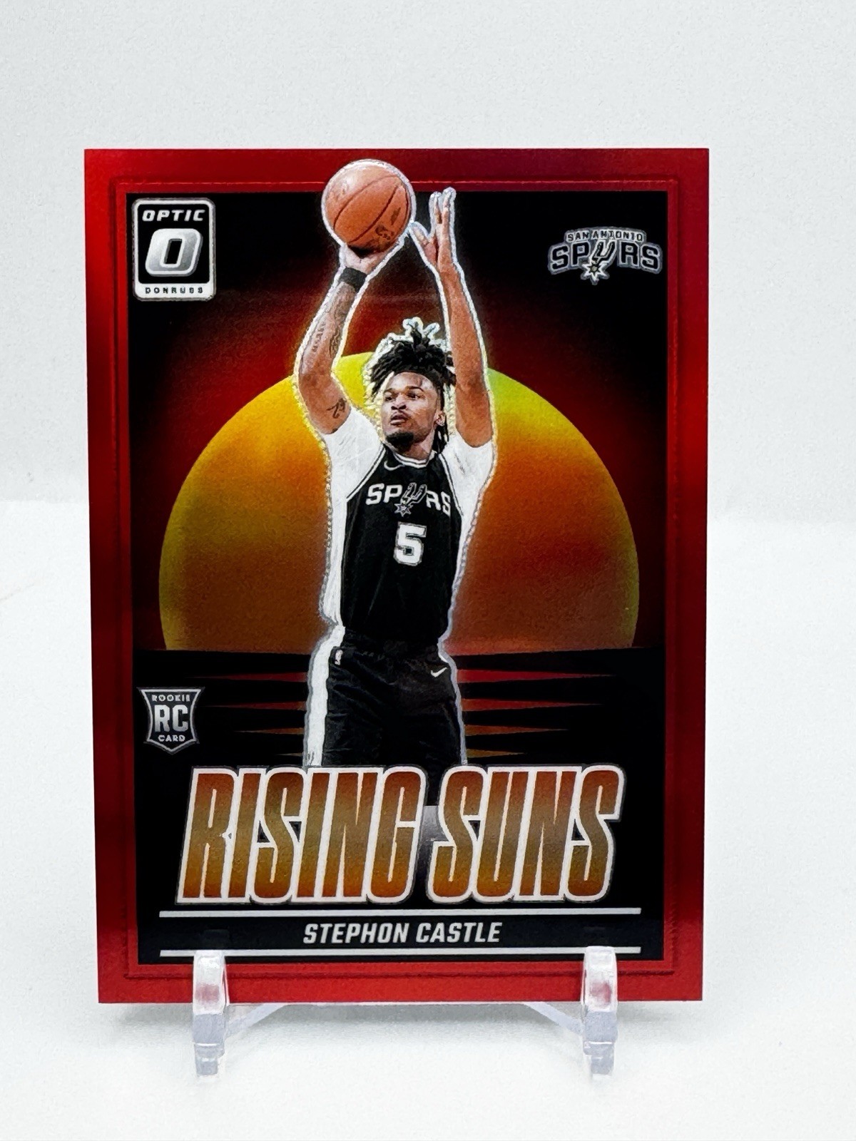 Stephon Castle 2024-25 Donruss Optic Rising Suns Red Prizm /99 RC #6