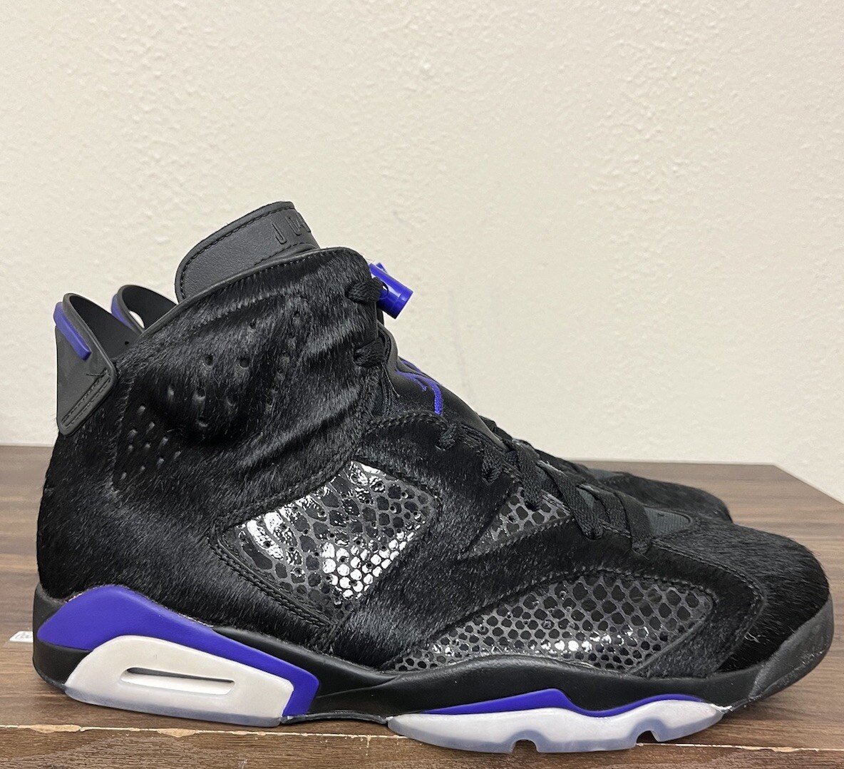 black and purple jordans 6