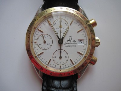 omega speedmaster automatic oro