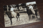 RPPC 2 ladies in split skirts & their mutts out for a ride mountain town    C#36 — photo 1