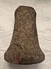 Ancient stone pestle or mano, likely used for grinding