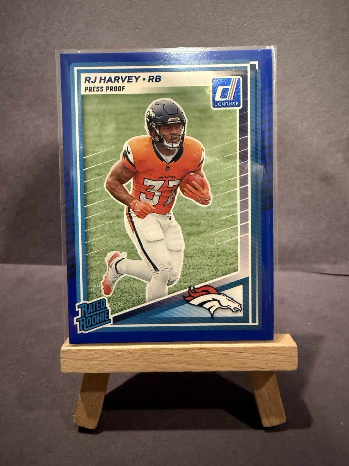 2025 Panini Donruss Rated Rookie RJ Harvey #312 Press Proof Blue
