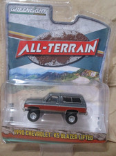 Greenlight 1990 Chevrolet K5 Blazer 4x4 grigio sollevato 1:64 pressofuso con pneumatici in gomma