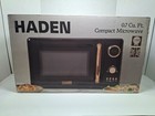 700 Watt 0.7 Cubic Foot Microwave Oven with Digital Controls, Defrost, and In...