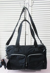 kipling front pocket satchel