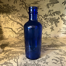Cobalt Blue Glass Bottle 2 oz Embossed M TD and 10 on Base