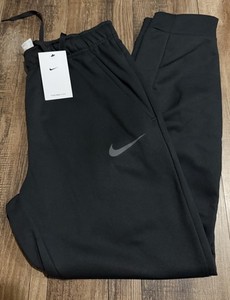 nike training tall therma tapered joggers in black