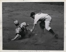 1941 Press Photo A baseball player tagged out at base in game with Indians