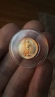 1988 $5 1/10oz American Gold Eagle BU Album Toned