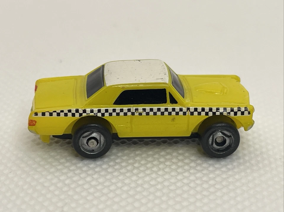 Micro Machine 1965 Pontiac GTO, Yellow w/ Checkerboard, TAXI, Hasbro (Lot MM5) - Image 2 of 4
