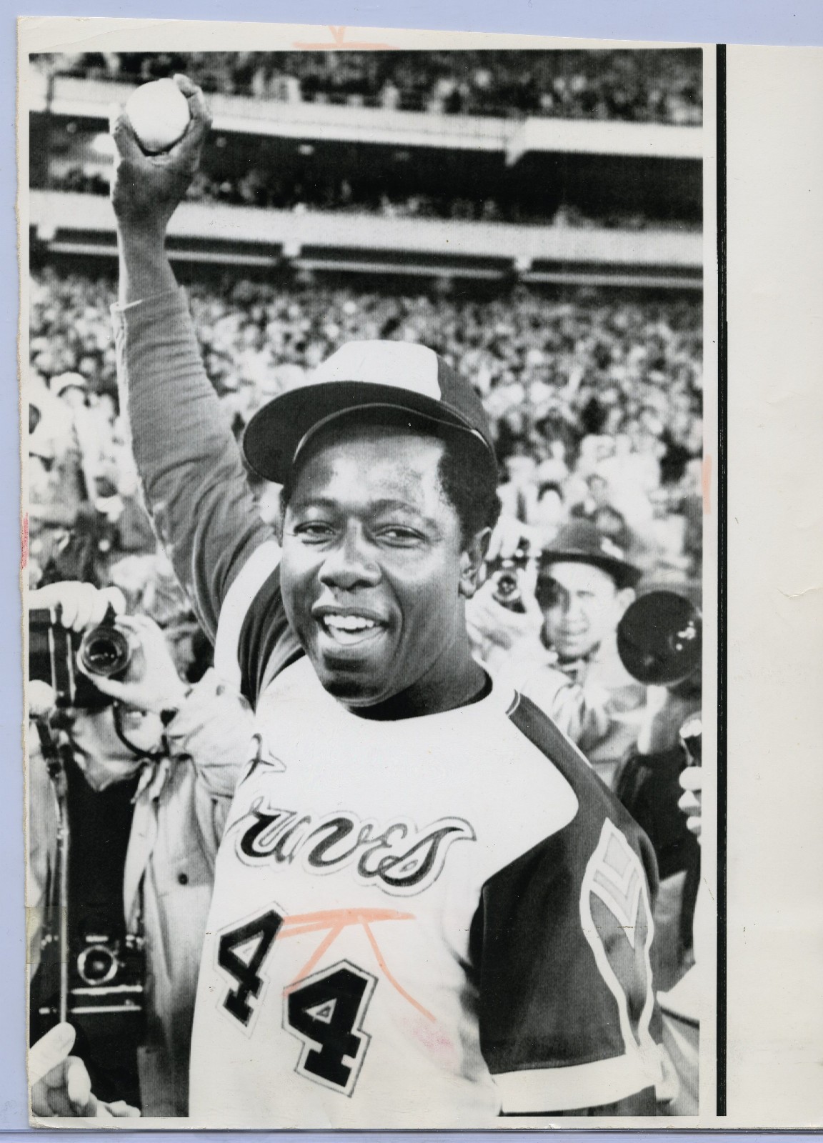 1974 HANK AARON - Holds up #715 HOME RUN BASEBALL - PSA Type III Original Photo