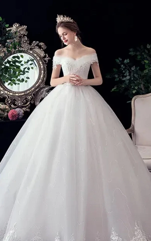 Vestido de novia, con escote barco, ajustable talla L, accesorios incluidos. Foto 4 de 4