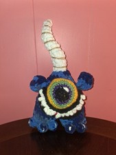 Amigurumi crocheted one eyed monster
