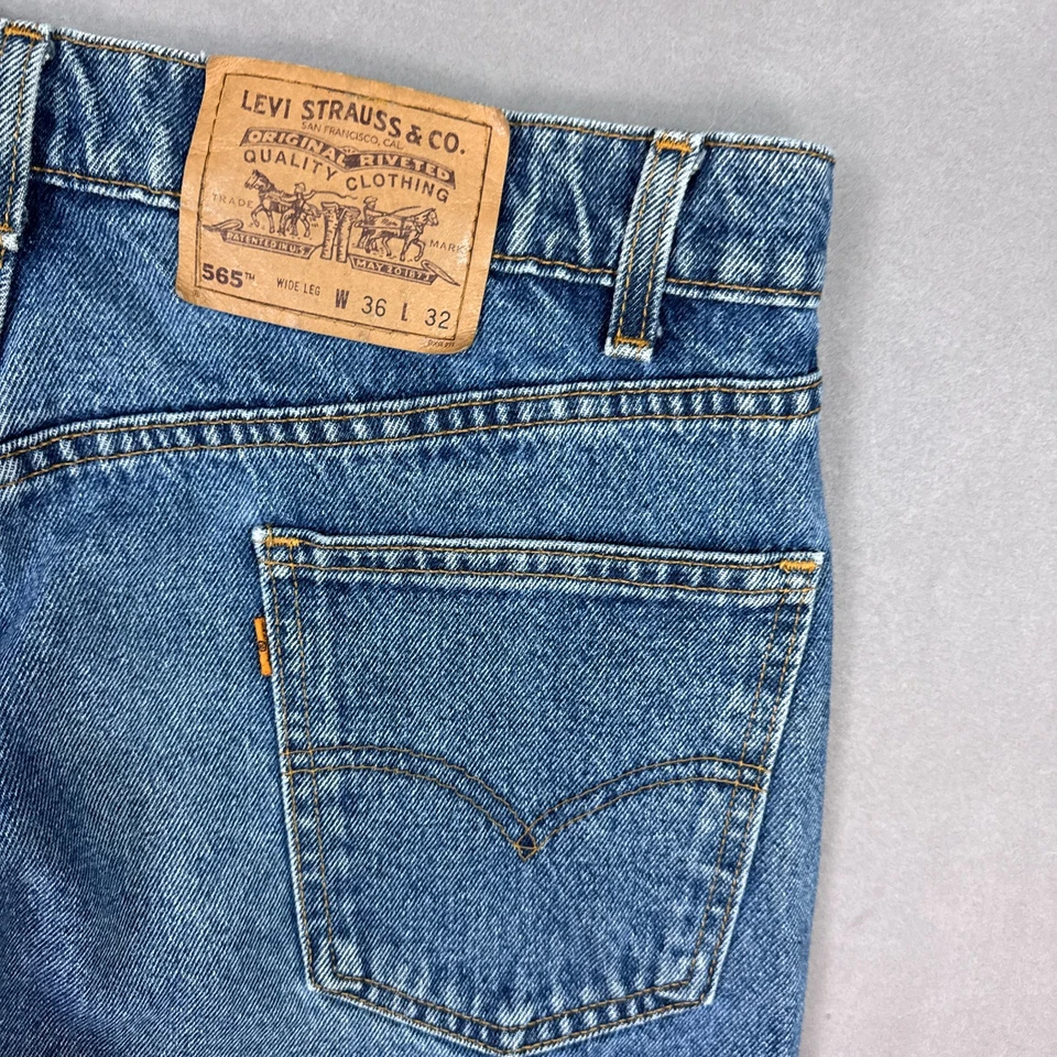 Pantalones de mezclilla vintage Levis para hombre 36x32 azul 565 pierna ancha lengüeta naranja años 90 hechos en EE. UU. Foto 3 de 4