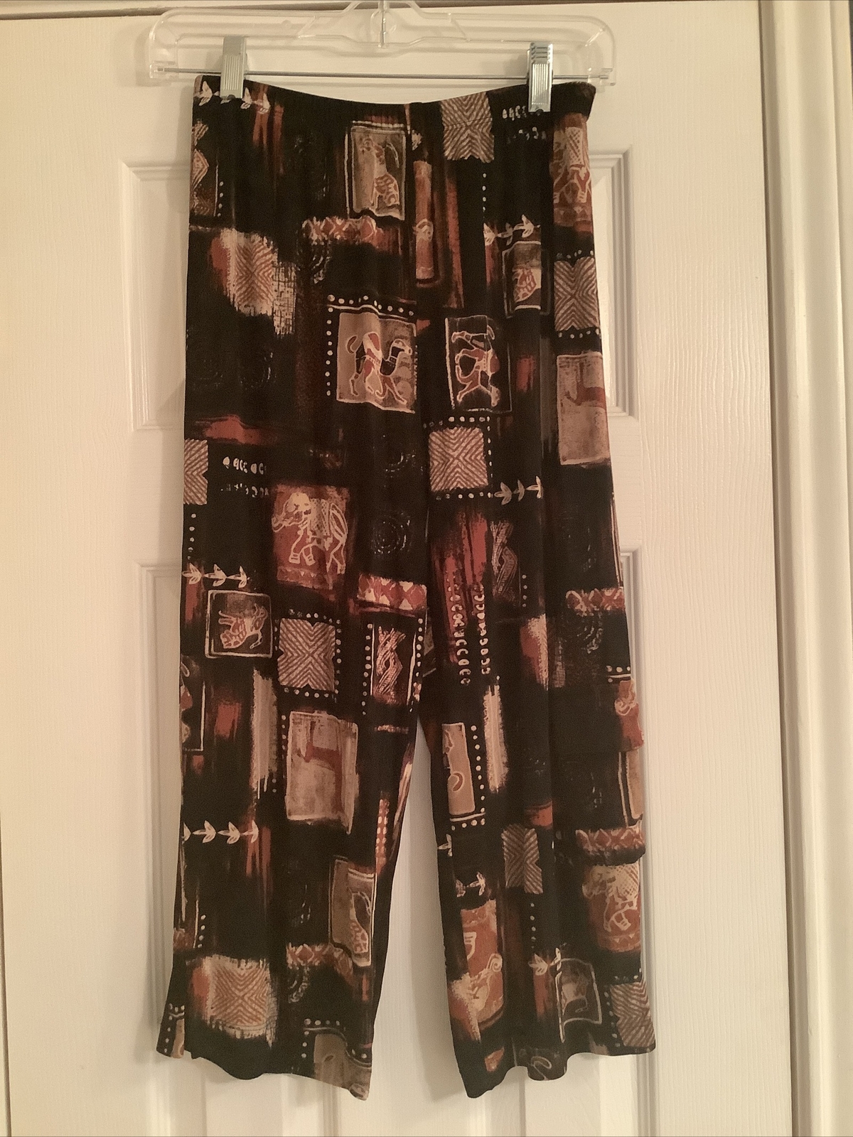 ALTRA Pantalone Chico's Travelers taglia 0 marrone nero caviglia ritagliata gamba larga cammello elefante