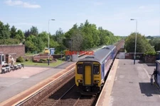 PHOTO  CLASS 156 156438 ENTERING WIGTON STATION -  DIESEL UNIT 156438 STOPS IN W