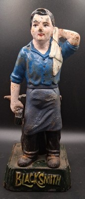 Cast Iron Blacksmith Door Stop 8 1/2 Inches Tall