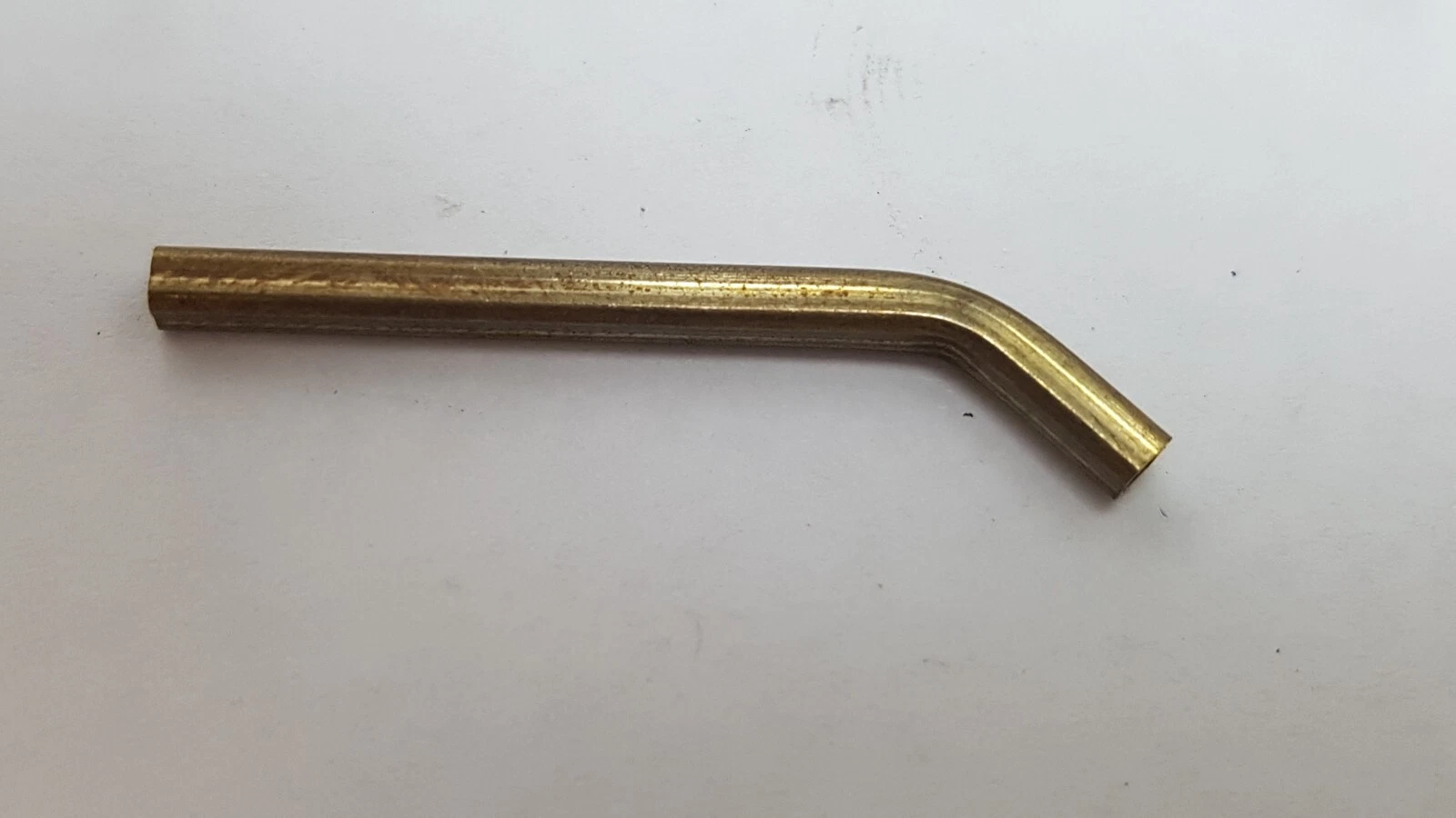 Close-up of one MS-10032400 tube showing the bend near one end