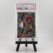 2024 Panini Spectra Christian McCaffrey Brilliance Neon Splatter /8 PSA 9
