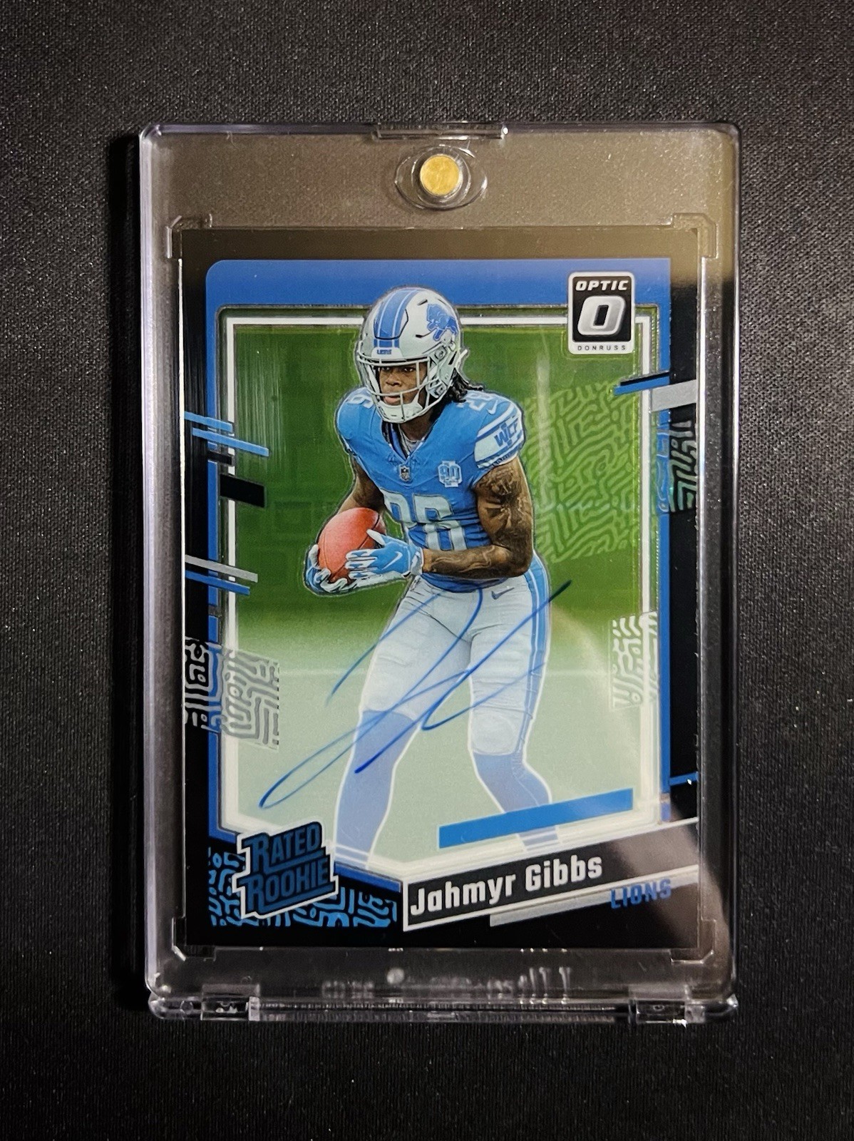 2023 Panini Donruss Optic Jahmyr Gibbs Black Pandora Prizm Rated Rookie Auto /25