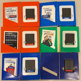 1980s MATTEL INTELLIVISION LOT OF 25 VIDEO GAMES W BOX SOME COMPLETE Q BERT +
