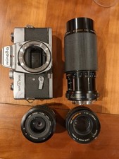 Minolta SRT 202 35mm Camera With 3 Lenses, A Set Of 3 Close Up Lens Adapters