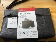 Mundi purifying wristlet black, NWT, never opened or used