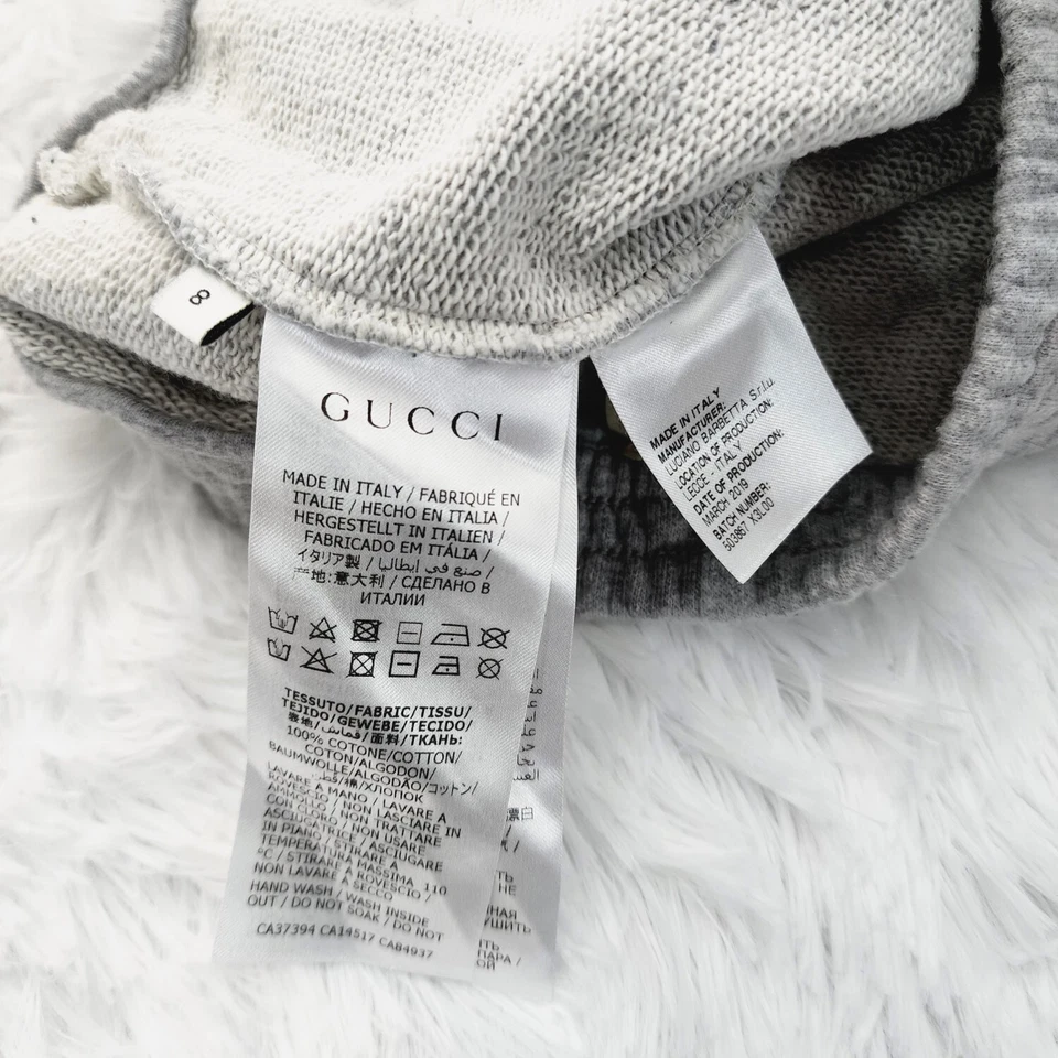 Pantalones deportivos Gucci grises clásicos con logotipo GG para niños talla 8 Foto 4 de 4