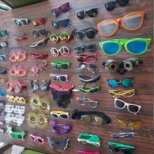 Sunglasses and Fun Party type costume glasses 60 pairs. used and some new