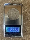 Three 1922 Silver Peace Dollars