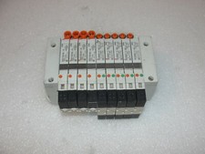 SMC Valve Bank with 9 Solenoid Valves VQ1200NY-5-X35 (5), VQ1101N-5 (4)