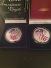 (2) 1999 AND 2000 AMERICAN SILVER EAGLE 1 OZ COINS COLORIZED UNC With COAs