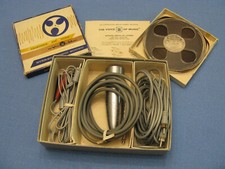 Voice Of Music Accessories And Recorded Tape With Microphone And Wires In Box