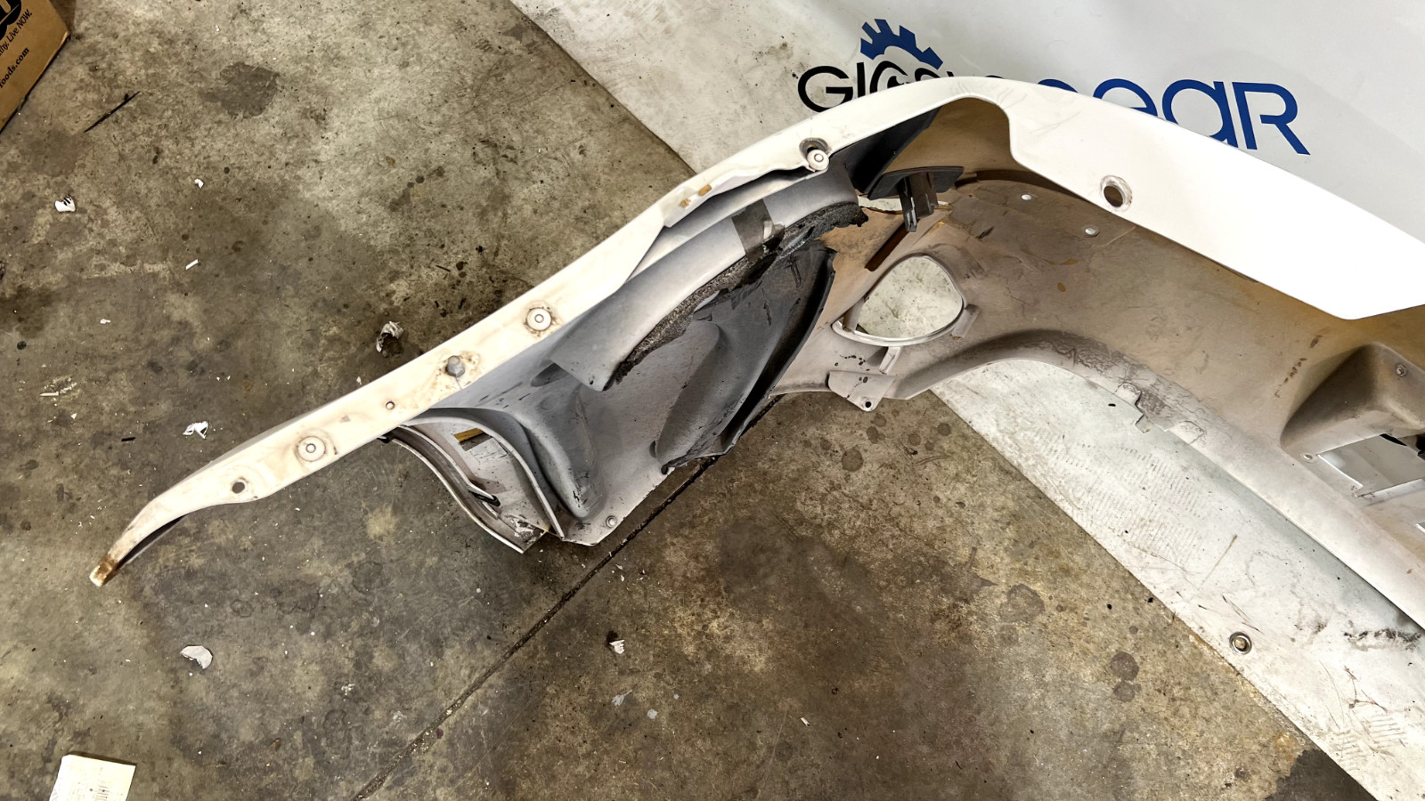 ASTON MARTIN VANTAGE V8 REAR BUMPER 2011 OEM -needs repaired at front edge-