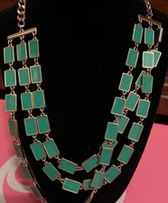 charming charlie branded green enamel and gold toned multi strand necklace