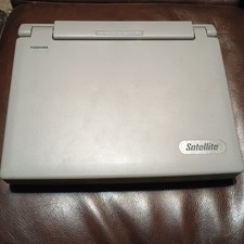 Toshiba Satellite 200CDS Vintage Laptop Powers On Read As Is