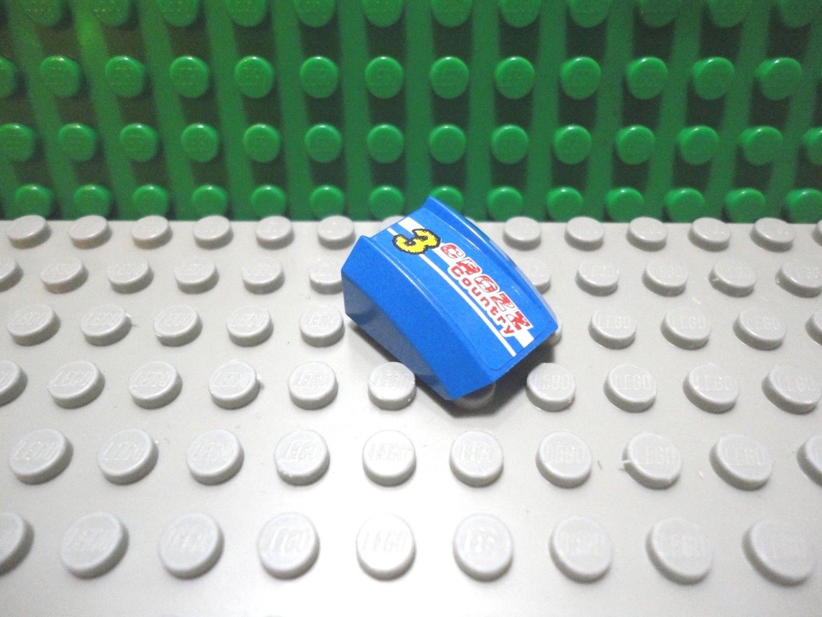 Lego Blue 2x2 sloped brick block with sticker of Crozz Country