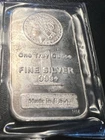 1 oz. Highland Mint Silver Bar - Morgan Dollar .999+ Fine - Sealed / Toning
