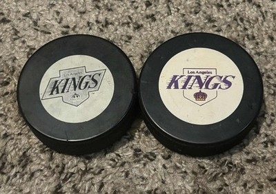 Lot of 2 Vintage Los Angeles Kings NHL Official Hockey Game Pucks