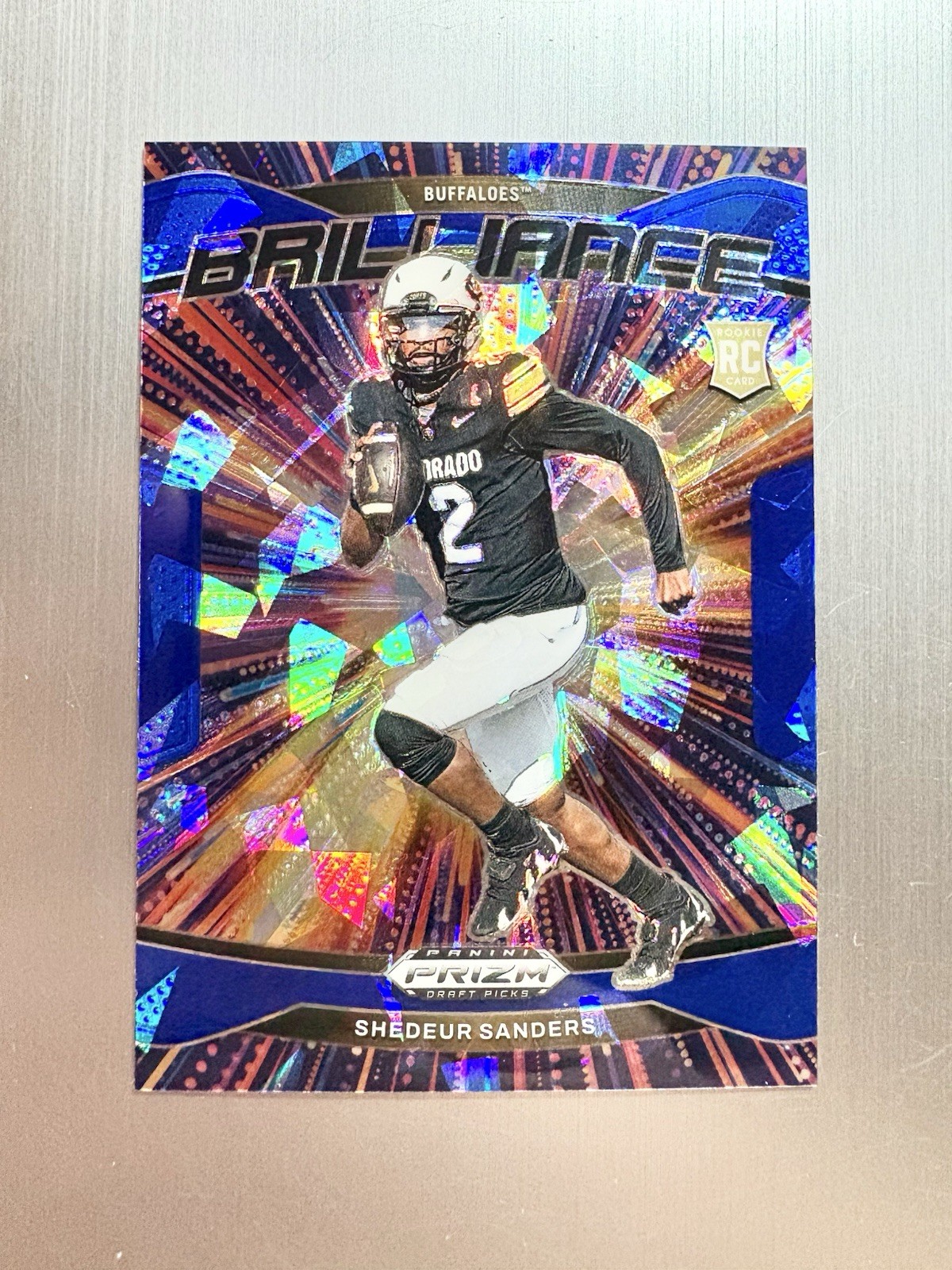Shedeur Sanders 2025 Panini Prizm Draft Picks Brilliance #18 Blue Ice #’d /149