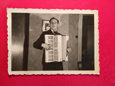 Old photo antique handsome man playing beautiful accordion man music old photo