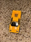 GoBots Pocket Puzzler Yellow Lamborghini Countach Tonka Bandai 1984