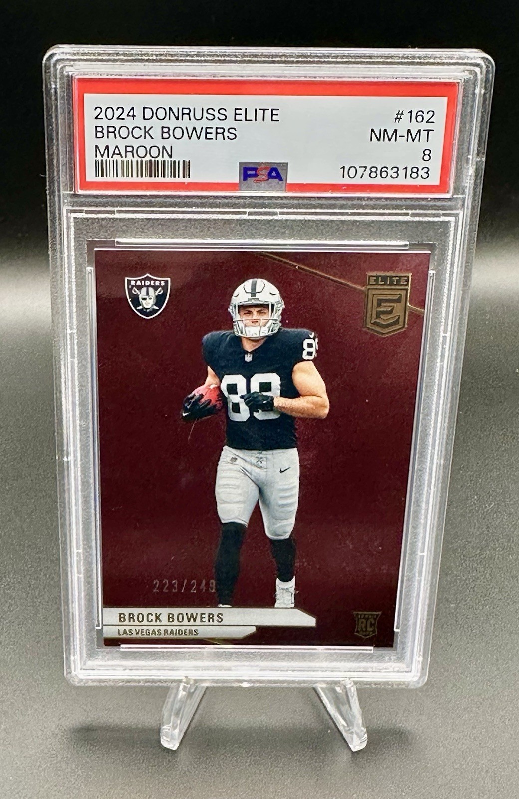 2024 Panini Donruss Elite - Rookies Brock Bowers #162 Maroon /249 (RC) PSA 8