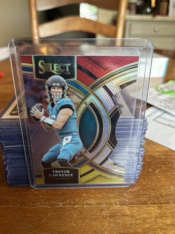 2023 Panini Select Premier Level Trevor Lawrence #181 Red & Yellow Prizm Die-Cut
