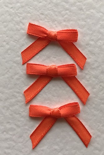 20 Pretty Bright Orange Tiny Bows made from 6mm Satin Ribbon for card making - Picture 3 of 3