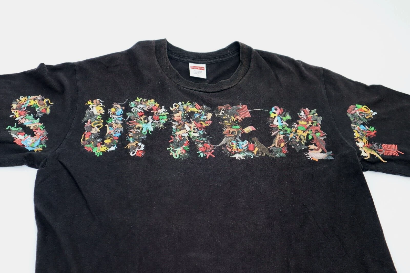 Grand T shirt noir animaux jouets coton logo Supreme Spell Out