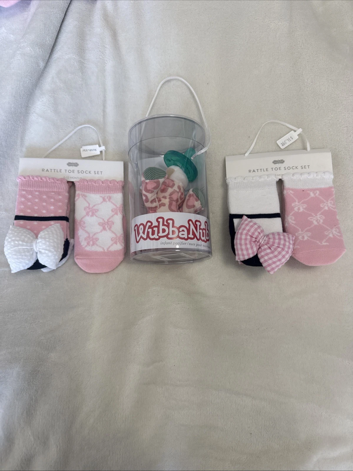 Set Of Two Rattle Toe Socks Socks 0-12 Months & WubbaNub Infant pacifier #98
Opens in a new window o