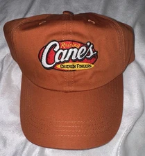 Raising Cane's Chicken Fingers  One Love Burnt Orange EmployeeCap New Adjustable