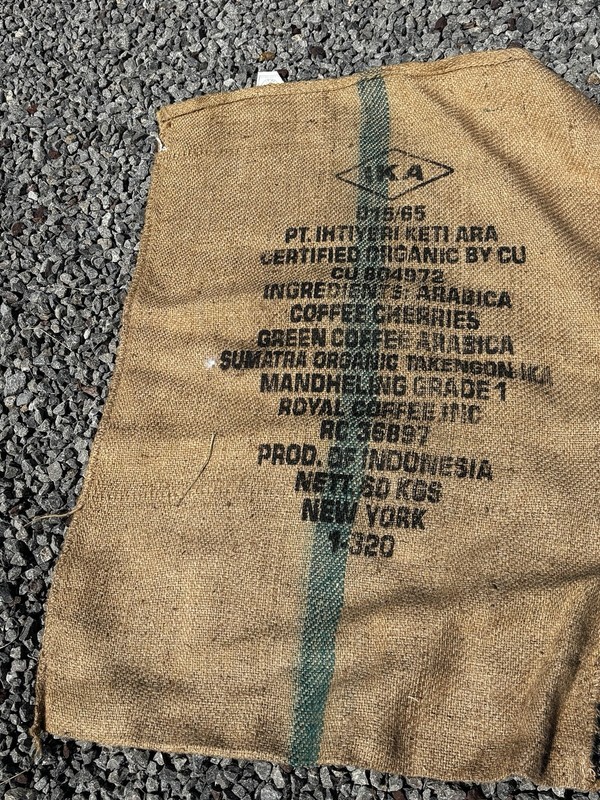 Empty Large Burlap Feed Sack With Markings From Country Of Origin