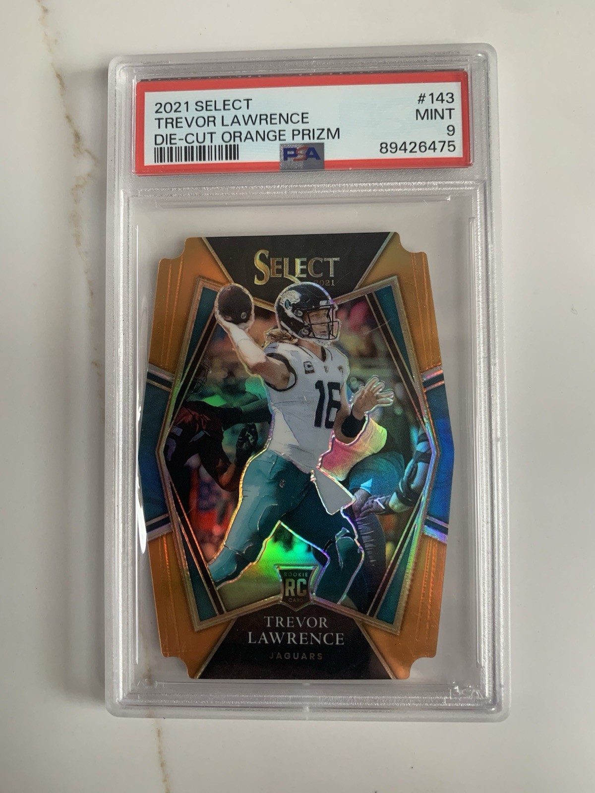 2021 Panini Select - Trevor Lawrence #143 Orange Prizm Die-Cut /249 (RC) PSA 9